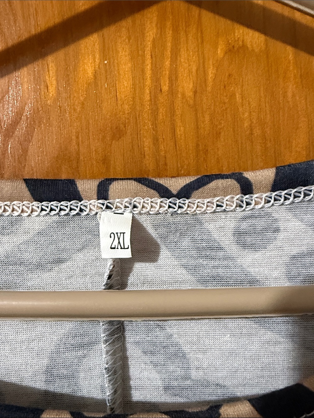 Beige and Black Sleeveless Mini Dress with Ornate Print - Picture 2 of 3